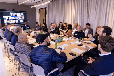 Governor Newsom and tech leaders with the California Breakout Project sitting around a conference table