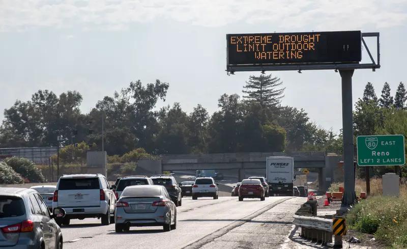 A highway sign warns of extreme drought conditions